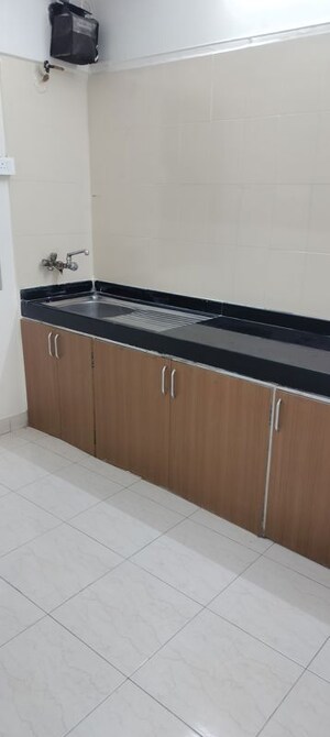 Kitchen in 2 BHK Apartment at Montreal Tower, Andheri West – for Rent