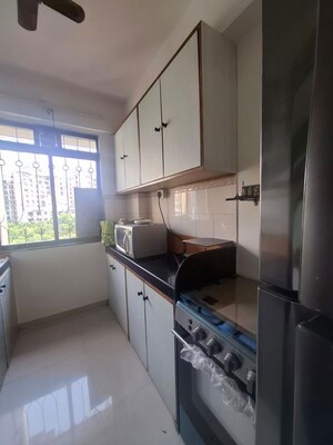 Kitchen in 2 BHK Apartment at Lodha Paradise, Majiwada – for Rent