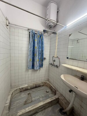 Bathroom in 1 BHK Apartment at Greater Kailash – for Rent