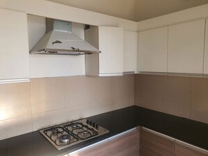 Kitchen in 3.5 BHK Apartment at Conscient Heritage Max, Sector 102 – for Rent