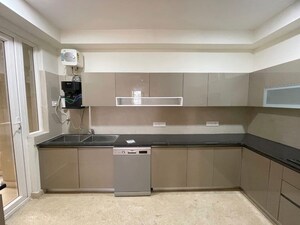 Kitchen in 3.5 BHK Apartment at Maya Green Lotus Utsav, International Airport Road – for Rent