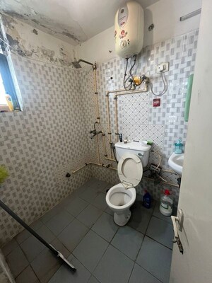 Bathroom in 2 BHK Apartment at Mittal Cosmos Executive Apartment, Sector 2 – for Rent