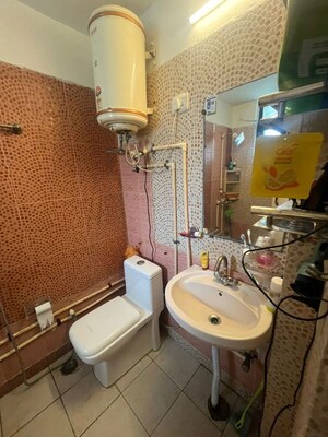 Bathroom in 2 BHK Apartment at Mittal Cosmos Executive Apartment, Sector 2 – for Rent