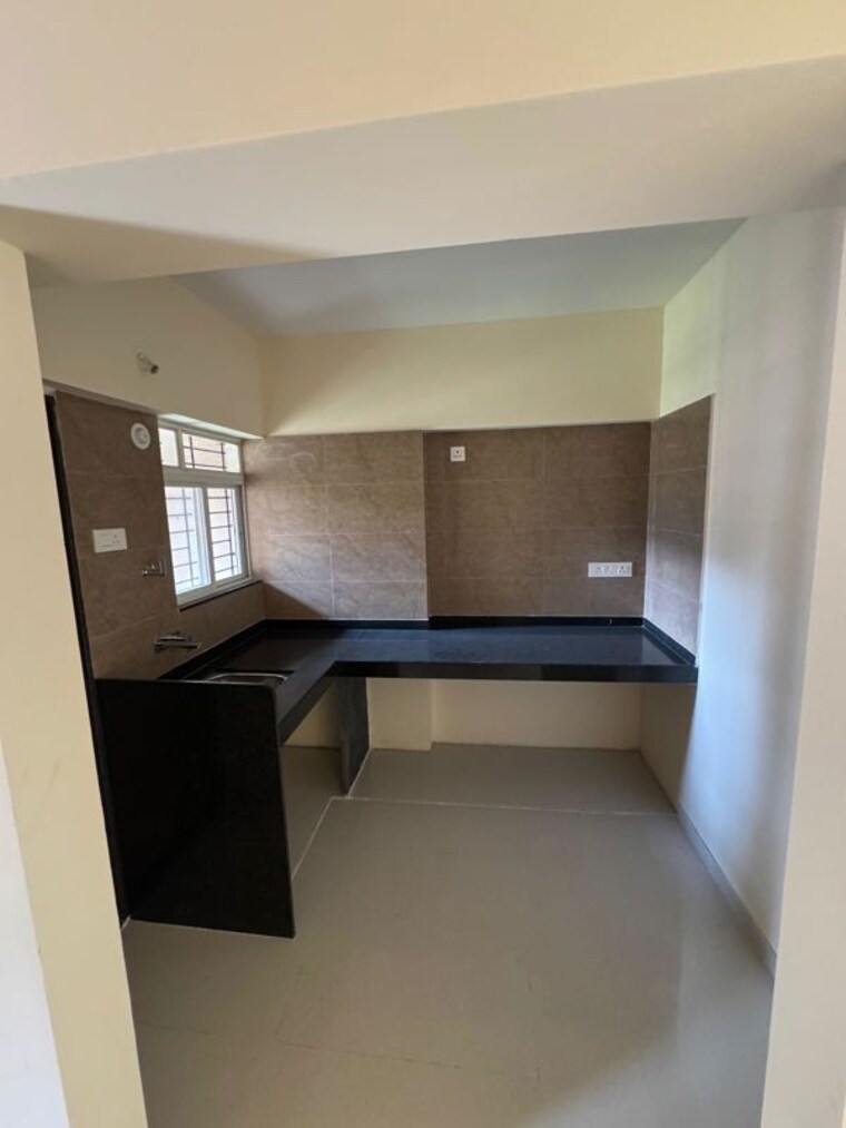 Kitchen, vertical-alcinia 2 Bedroom 800 Sq.Ft. Apartment In Mohammadwadi Pune 10388665