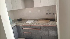 Kitchen in 2 BHK Apartment at Proview Officer City 2, Raj Nagar Extension – for Rent