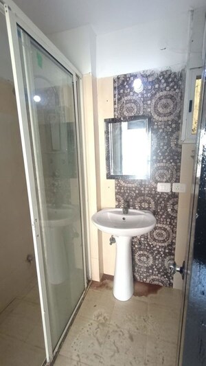 Bathroom in 2 BHK Apartment at Prateek Wisteria, Sector 77 – for Rent