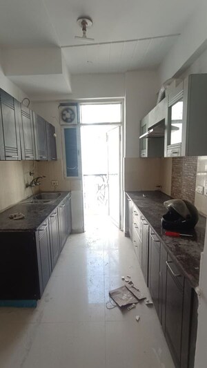 Kitchen in 2 BHK Apartment at Prateek Wisteria, Sector 77 – for Rent