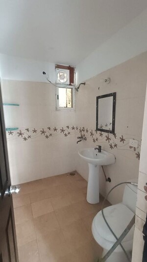 Bathroom in 2 BHK Apartment at Prateek Wisteria, Sector 77 – for Rent