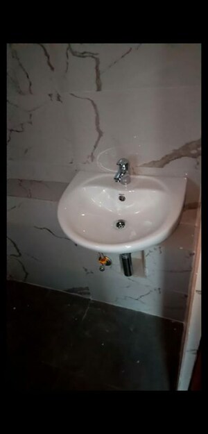 Attached Bathroom in 2 BHK Apartment at Sheth Auris Bliss, Malad West – for Rent