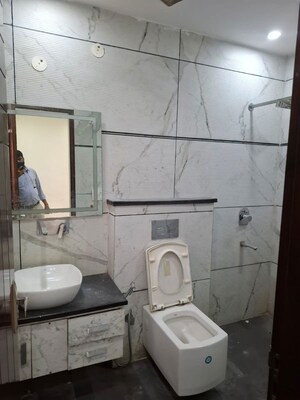Bathroom in 4 BHK Apartment at Unitech The Close North, Sector 50 – for Sale