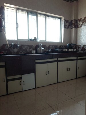 Kitchen in 2 BHK Apartment at Kumar Corner, Camp – for Sale