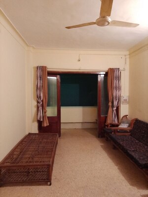 Living Room in 1 BHK Apartment at Clover Center, Camp – for Rent