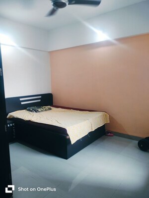 Bedroom in 2 BHK Apartment at Solitaire Apartment, Dhanori – for Rent
