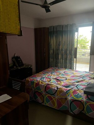 Bedroom in 2 BHK Apartment at Solitaire Apartment, Dhanori – for Rent