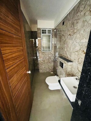 Bathroom in 3 BHK Apartment at Sai Samarttha Saisha, Punawale – for Rent