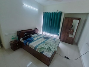 Bedroom in 2 BHK Apartment at Kumar Urban Kul Ecoloch, Mahalunge – for Rent
