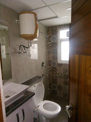 Bathroom in 3 BHK Apartment at NK Sharma Savitry Greens 2, Ghazipur – for Rent
