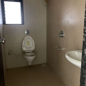 Bathroom in 3 BHK Apartment at Greenfield Om Satyam Niwas CHS, Dalvi Nagar – for Rent
