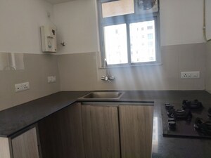 Kitchen in 1 BHK Apartment at Hiranandani The Walk, Ghodbunder Road – for Rent