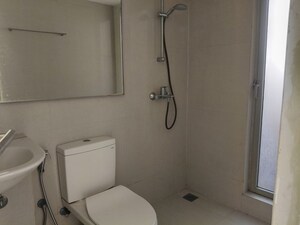 Bathroom in 1 BHK Apartment at Hiranandani The Walk, Ghodbunder Road – for Rent