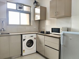 Kitchen in 1 BHK Apartment at Hiranandani The Walk, Ghodbunder Road – for Rent