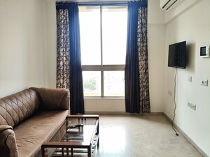 Living Room in 1 BHK Apartment at Hiranandani The Walk, Ghodbunder Road – for Rent