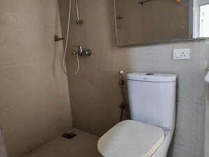 Bathroom in 1 BHK Apartment at Hiranandani The Walk, Ghodbunder Road – for Rent