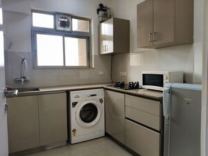 Kitchen in 1 BHK Apartment at Hiranandani The Walk, Ghodbunder Road – for Rent