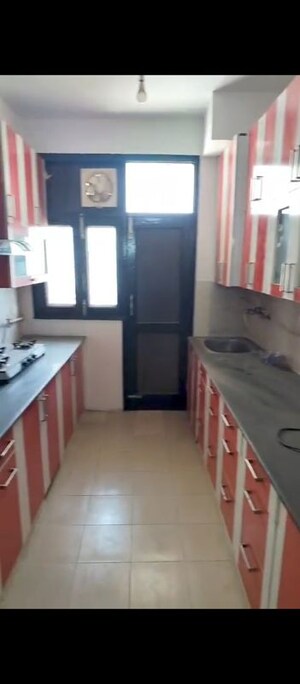 Kitchen in 2.5 BHK Apartment at Amrapali Hanging Gardens, Sector 107 – for Rent