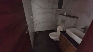 Bathroom in 3 BHK Apartment at Riverdale Hazelwood Residences, High Ground – for Rent