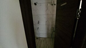 Bathroom in 3 BHK Apartment at Riverdale Hazelwood Residences, High Ground – for Rent