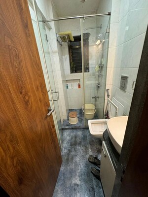 Bathroom in 3 BHK Apartment at Riddhi Gardens CHS, Malad East – for Rent