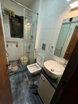 Bathroom in 3 BHK Apartment at Riddhi Gardens CHS, Malad East – for Rent