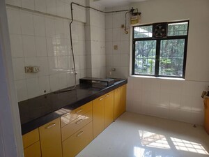 Kitchen in 2 BHK Apartment at Shiv Riddhi Lok Kailash CHS, Mulund West – for Rent