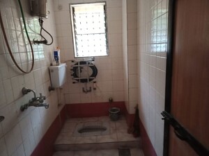 Bathroom in 2 BHK Apartment at Shiv Riddhi Lok Kailash CHS, Mulund West – for Rent