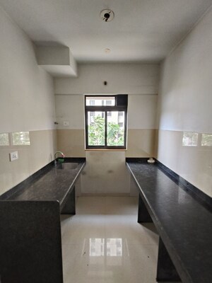 Kitchen in 1 BHK Apartment at Lodha Downtown, Dombivli East – for Rent