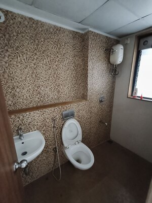 Bathroom in 1 BHK Apartment at Lodha Downtown, Dombivli East – for Rent