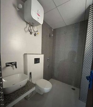 Bathroom in 3 BHK Apartment at Affinity Greens, International Airport Road – for Rent