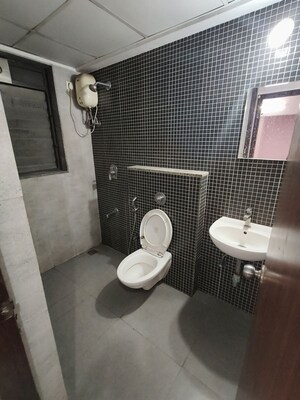 Bathroom in 1 BHK Apartment at Lodha Lakeshore Greens, Dombivli East – for Rent