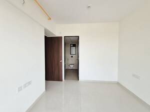 Master Bedroom in 1 BHK Apartment at Runwal My City Phase II Cluster 05, Dombivli East – for Rent