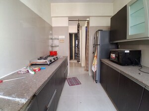 Kitchen in 2 BHK Apartment at Aditya Planet, Kharghar – for Rent