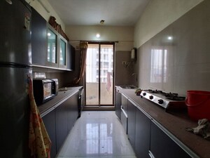 Kitchen in 2 BHK Apartment at Aditya Planet, Kharghar – for Rent