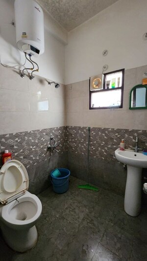 Bathroom in 2 BHK Builder Floor at Govind Vihar – for Rent