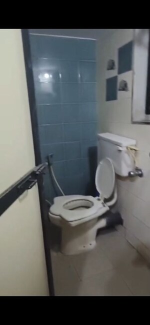 Bathroom in 2 BHK Apartment at Divya Smruthi, Malad West – for Rent