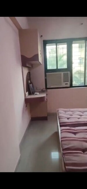 Bedroom in 2 BHK Apartment at Divya Smruthi, Malad West – for Rent