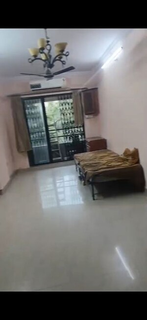 Living Room in 2 BHK Apartment at Divya Smruthi, Malad West – for Rent