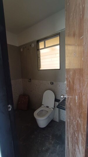 Bathroom in 2 BHK Apartment at Welworth Purnam, Hinjewadi – for Rent