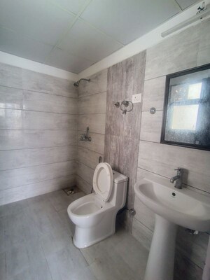 Bathroom in 2 BHK Apartment at Gulshan Bellina, Sector 16 Greater Noida – for Rent