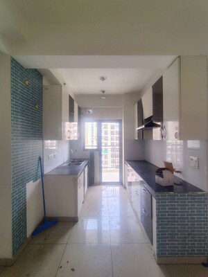 Kitchen in 2 BHK Apartment at Gulshan Bellina, Sector 16 Greater Noida – for Rent