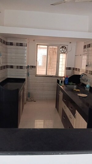 Kitchen in 2 BHK Apartment at GK Rose Icon, Pimple Saudagar – for Sale
